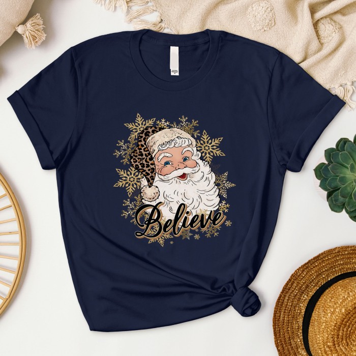 Leopard Santa Hat Christmas Shirt with 'Believe' Design, Santa Shirt in Leopard Print with 'Believe', Leopard Print Santa Shirt Leopard Santa Hat Christmas Shirt with 'Believe' Design, Santa Shirt in Leopard Print with 'Believe', Leopard Print Santa Shirt