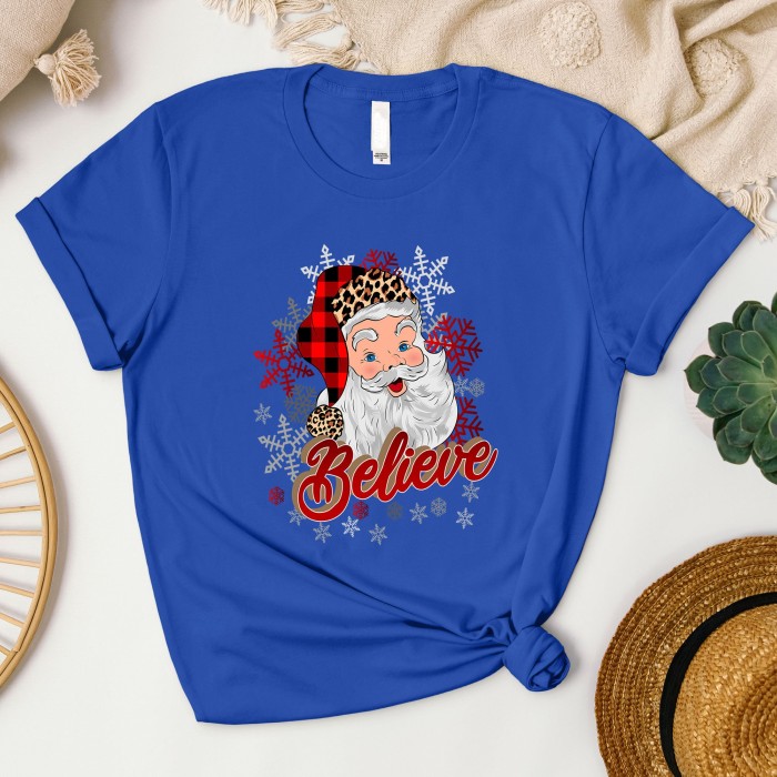 Leopard Santa Hat Christmas Shirt with 'Believe' Design, Santa Shirt in Leopard Print with 'Believe', Leopard Print Santa Shirt Leopard Santa Hat Christmas Shirt with 'Believe' Design, Santa Shirt in Leopard Print with 'Believe', Leopard Print Santa Shirt