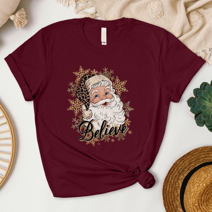 Leopard Santa Hat Christmas Shirt with 'Believe' Design, Santa Shirt in Leopard Print with 'Believe', Leopard Print Santa Shirt Leopard Santa Hat Christmas Shirt with 'Believe' Design, Santa Shirt in Leopard Print with 'Believe', Leopard Print Santa Shirt