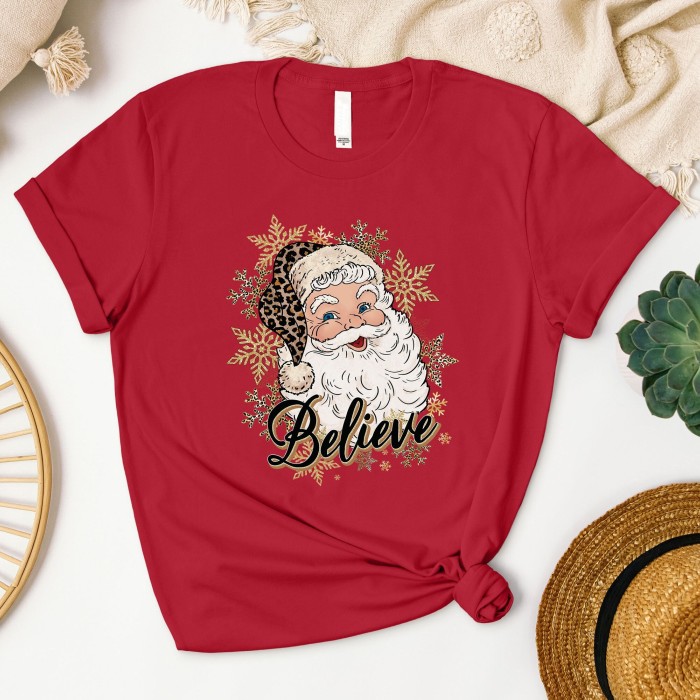 Leopard Santa Hat Christmas Shirt with 'Believe' Design, Santa Shirt in Leopard Print with 'Believe', Leopard Print Santa Shirt Leopard Santa Hat Christmas Shirt with 'Believe' Design, Santa Shirt in Leopard Print with 'Believe', Leopard Print Santa Shirt